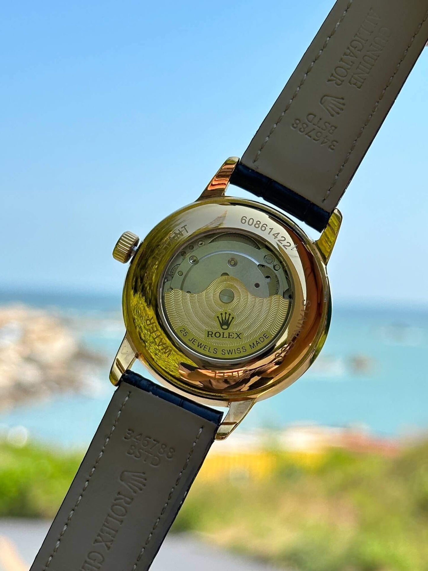 Rolex Datejust 36 in Yellow Gold with Champagne Dial and Black Leather Strap