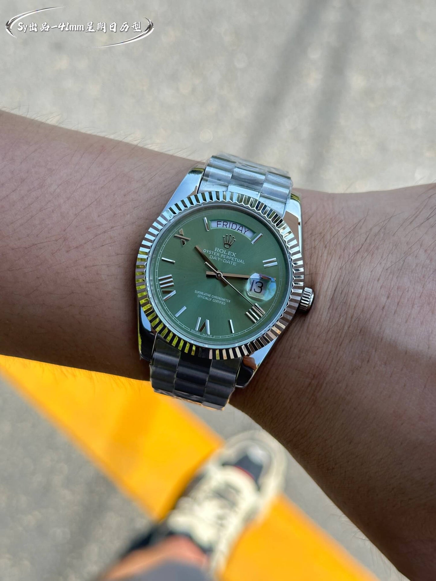 Rolex Day-Date 40 White Gold Green Roman Dial Fluted Bezel President Bracelet