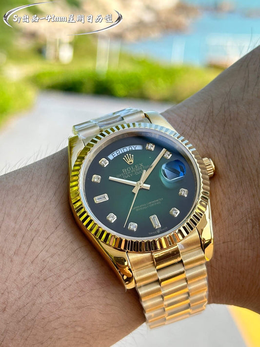Rolex Day-Date 40 228238 40mm 18k Yellow Gold Green Dial Diamond Hour Markers Fluted Bezel President Bracelet