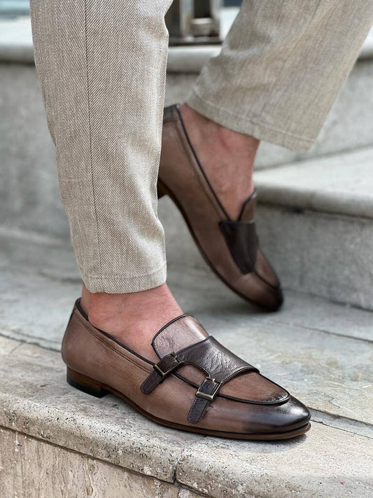 Man wearing Sorrento Double Monk Loafers in brown leather with beige trousers