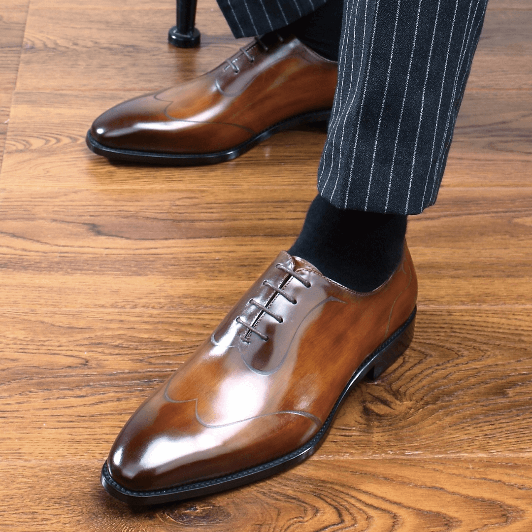 Brown leather oxford shoes on display