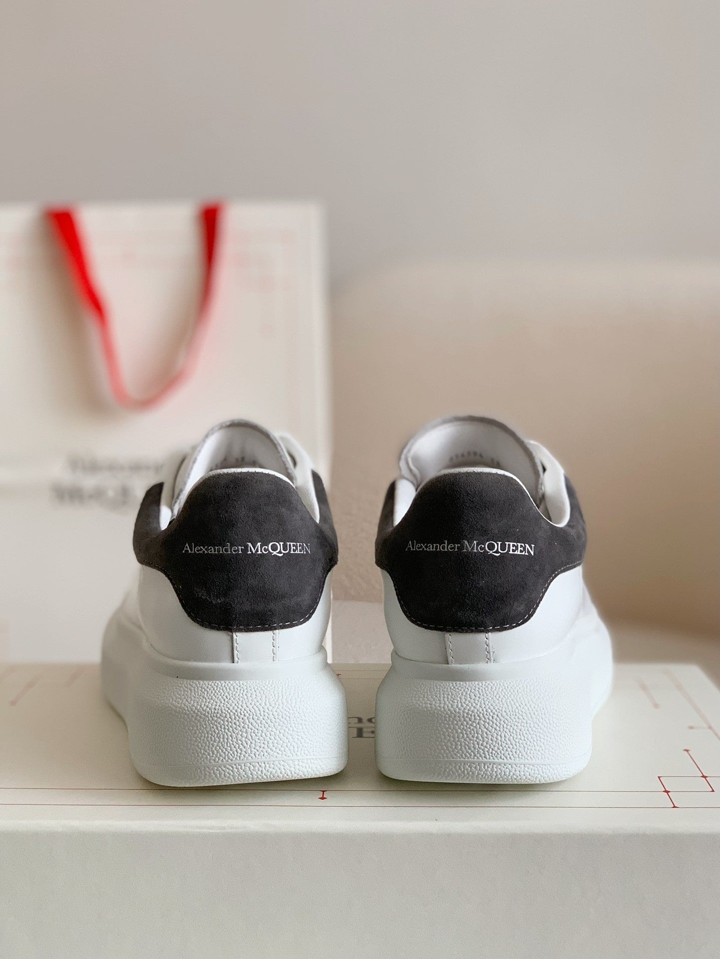 Alexander McQueen White Leather Oversized Sneakers with Black Suede Heel Tab