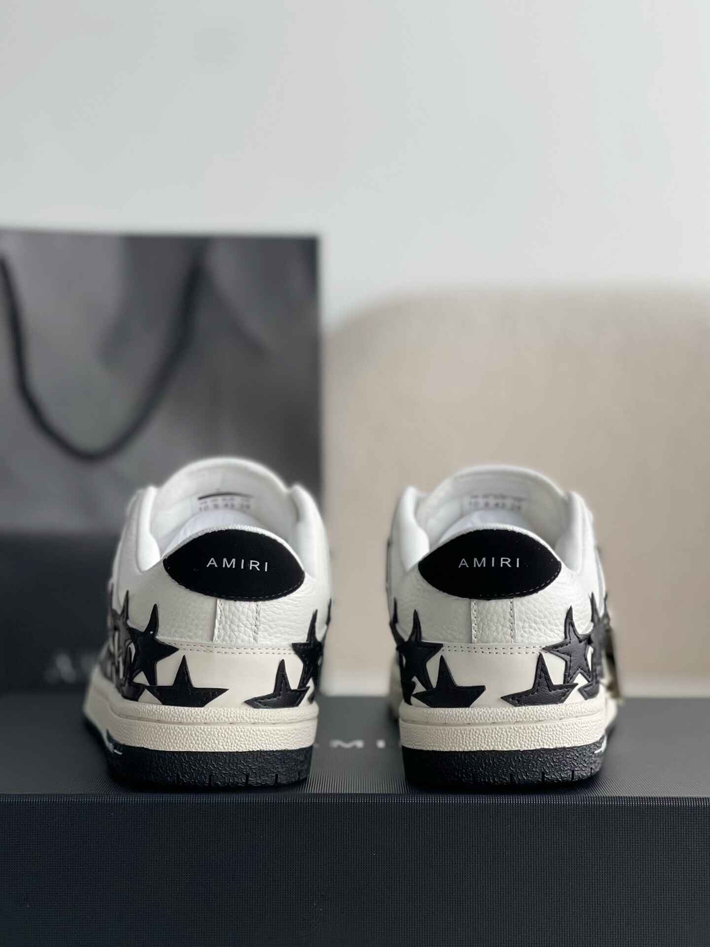 Amiri Star Burst Low – White Grained Leather & Black Stars