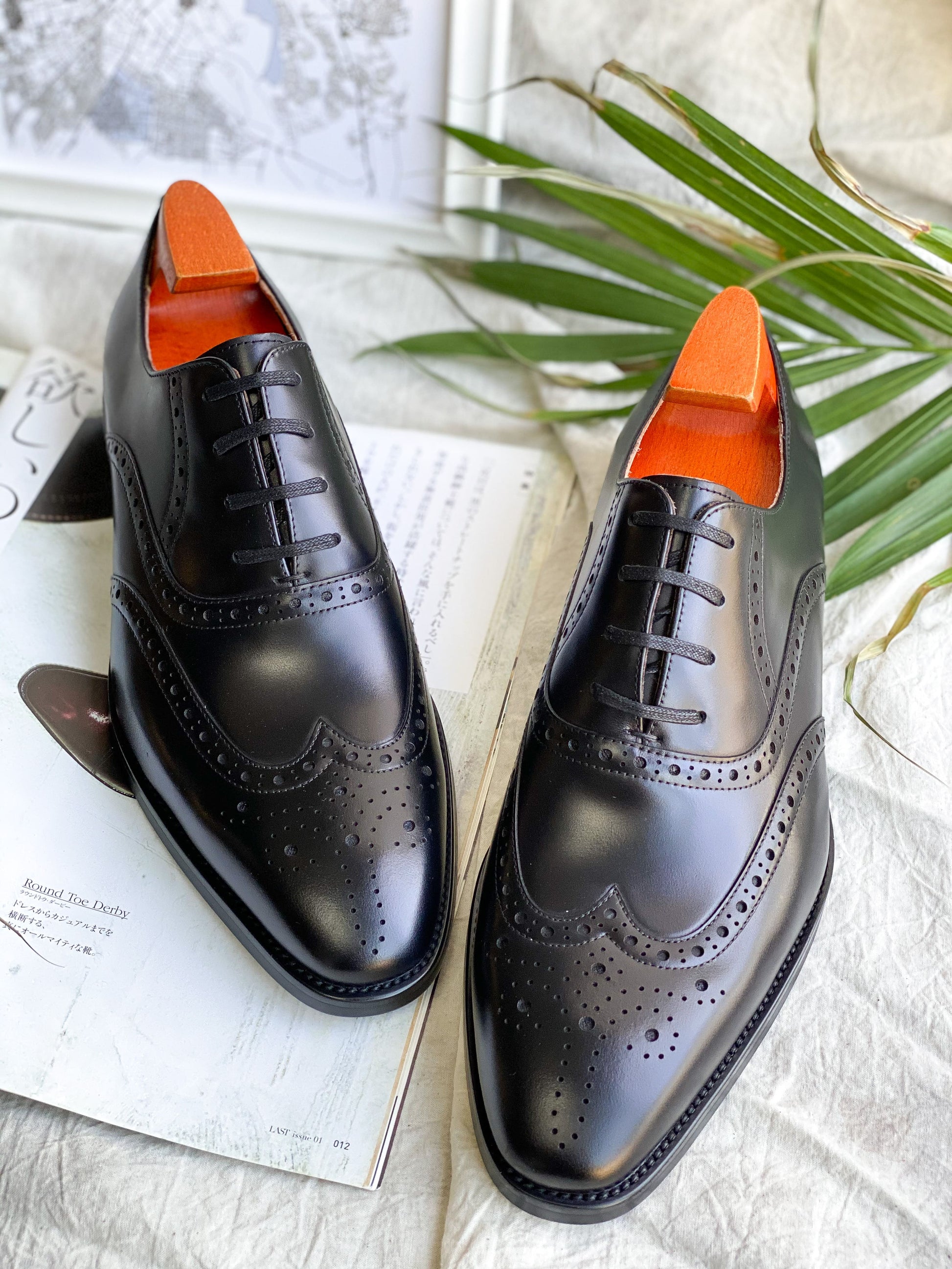 Black Leather Wingtip Oxford Shoes with Brogue Detailing