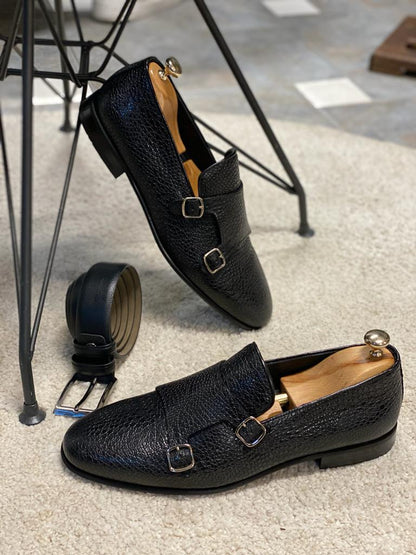Black Grained Leather Double Monk Strap Shoes – pair with shoe trees and matching black belt, on a white rug, showcasing classic design and durable neolite sole.