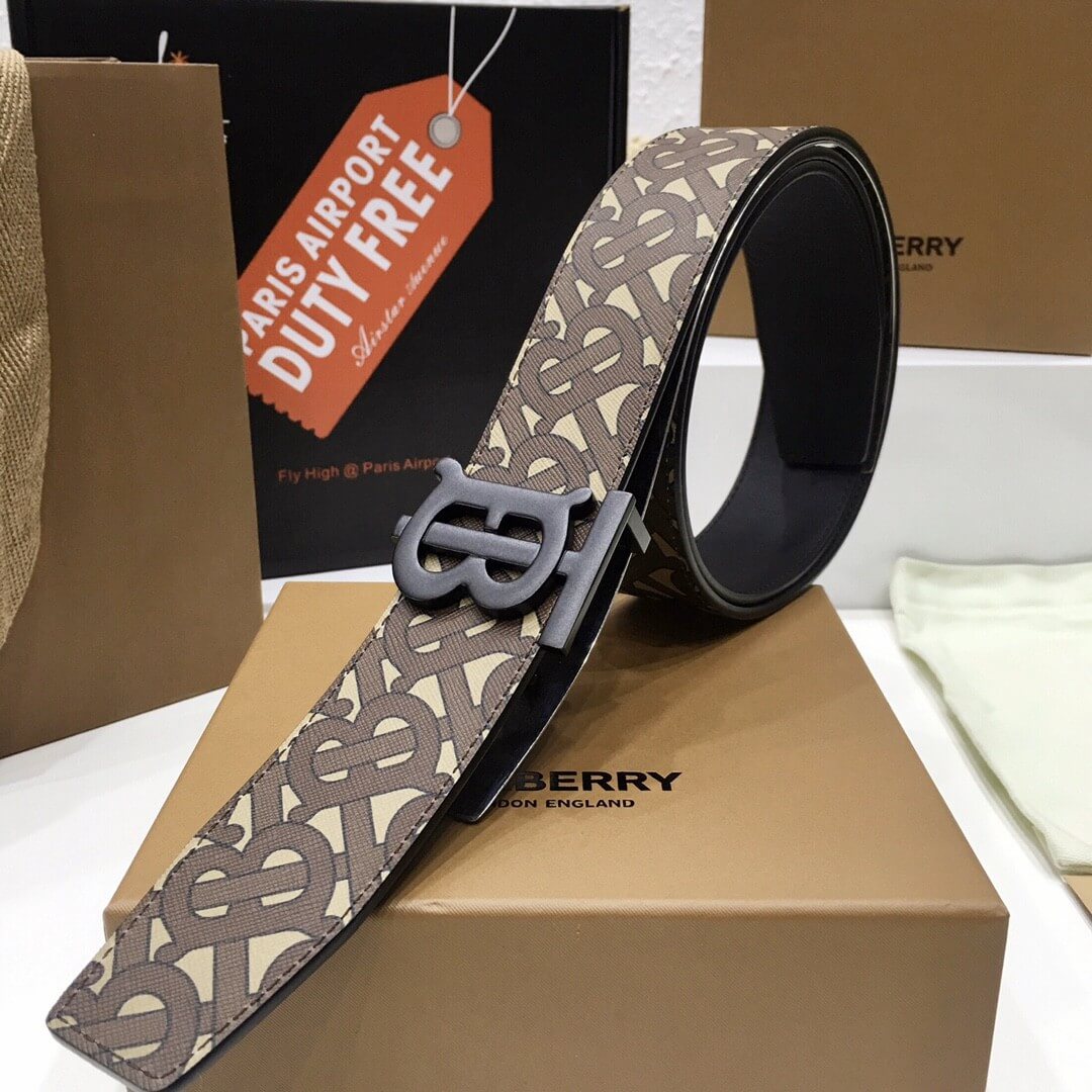 Burberry belt on a branded box with 'Paris Airport Duty Free' tag in the background.