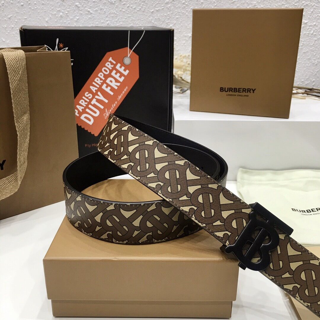 Burberry belt on a box with 'Paris Airport Duty Free' tag and Burberry packaging in the background.