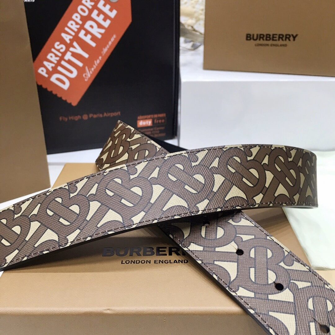 Burberry belt with logo on a box and airport duty free sign in the background