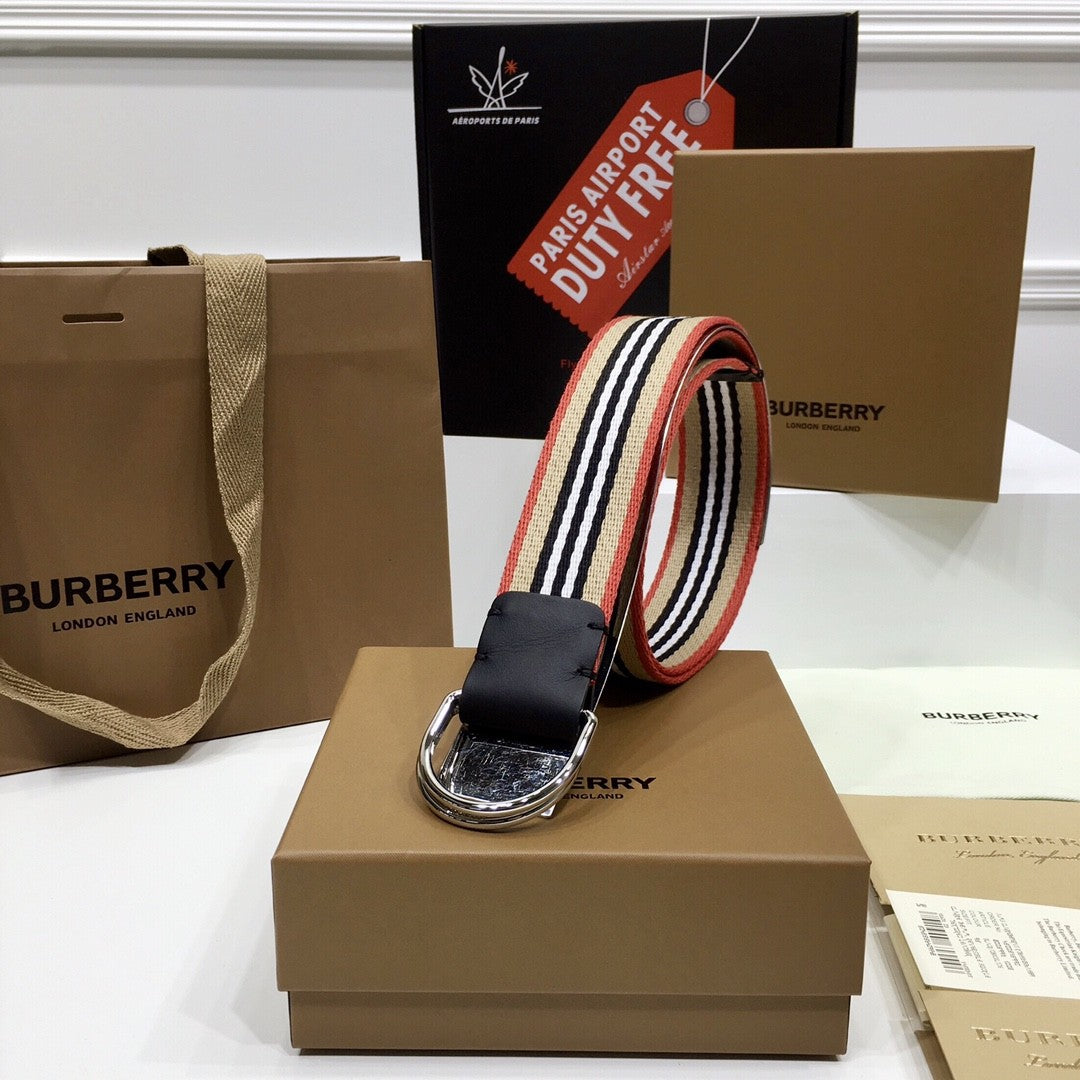 Burberry belt on a box with branded packaging in the background