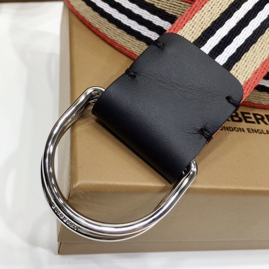Close-up of a belt with a black buckle on a box