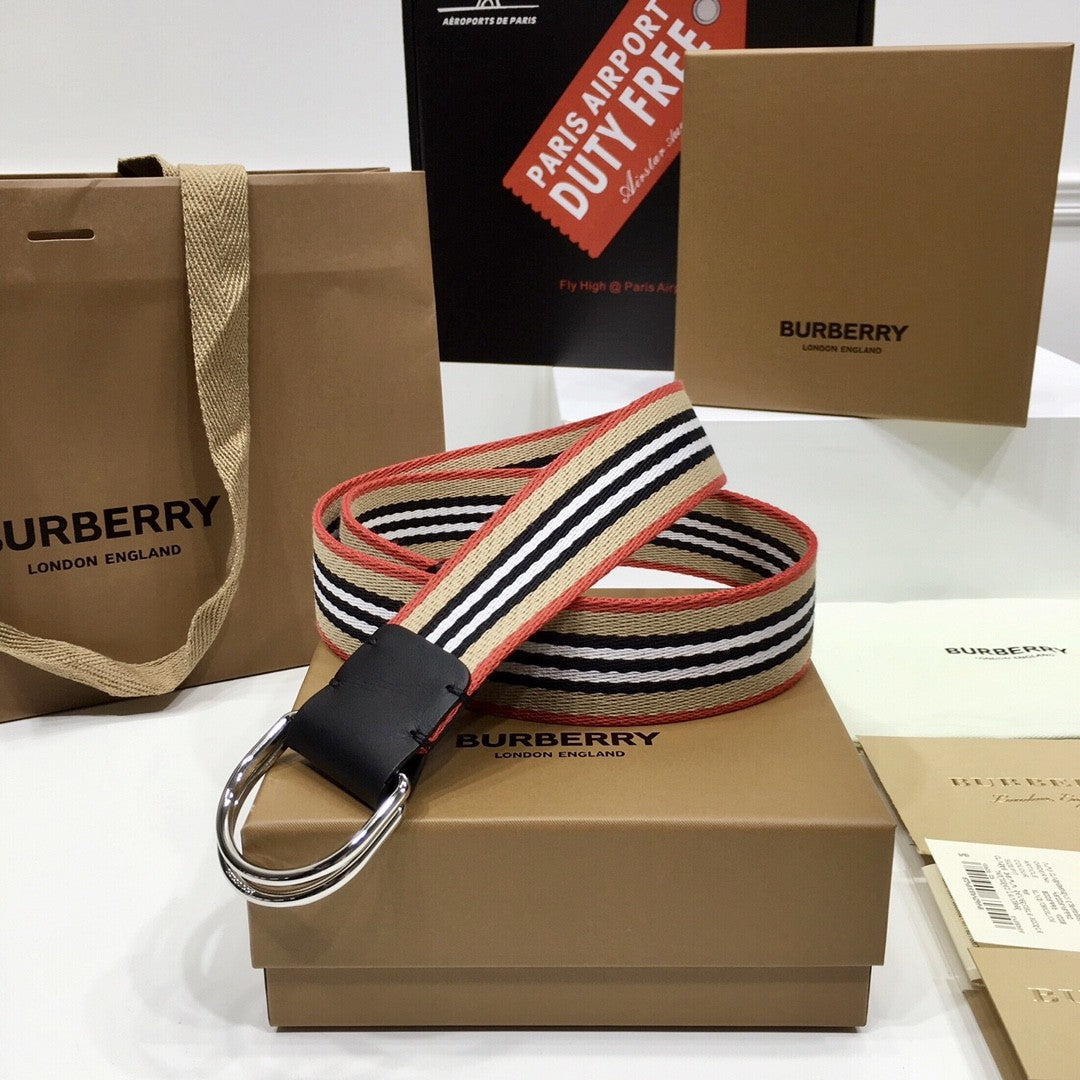 Burberry belt and packaging on a white background