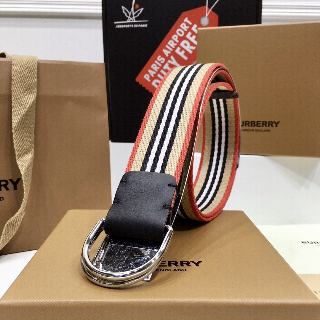 Striped belt with a black buckle on a Burberry box