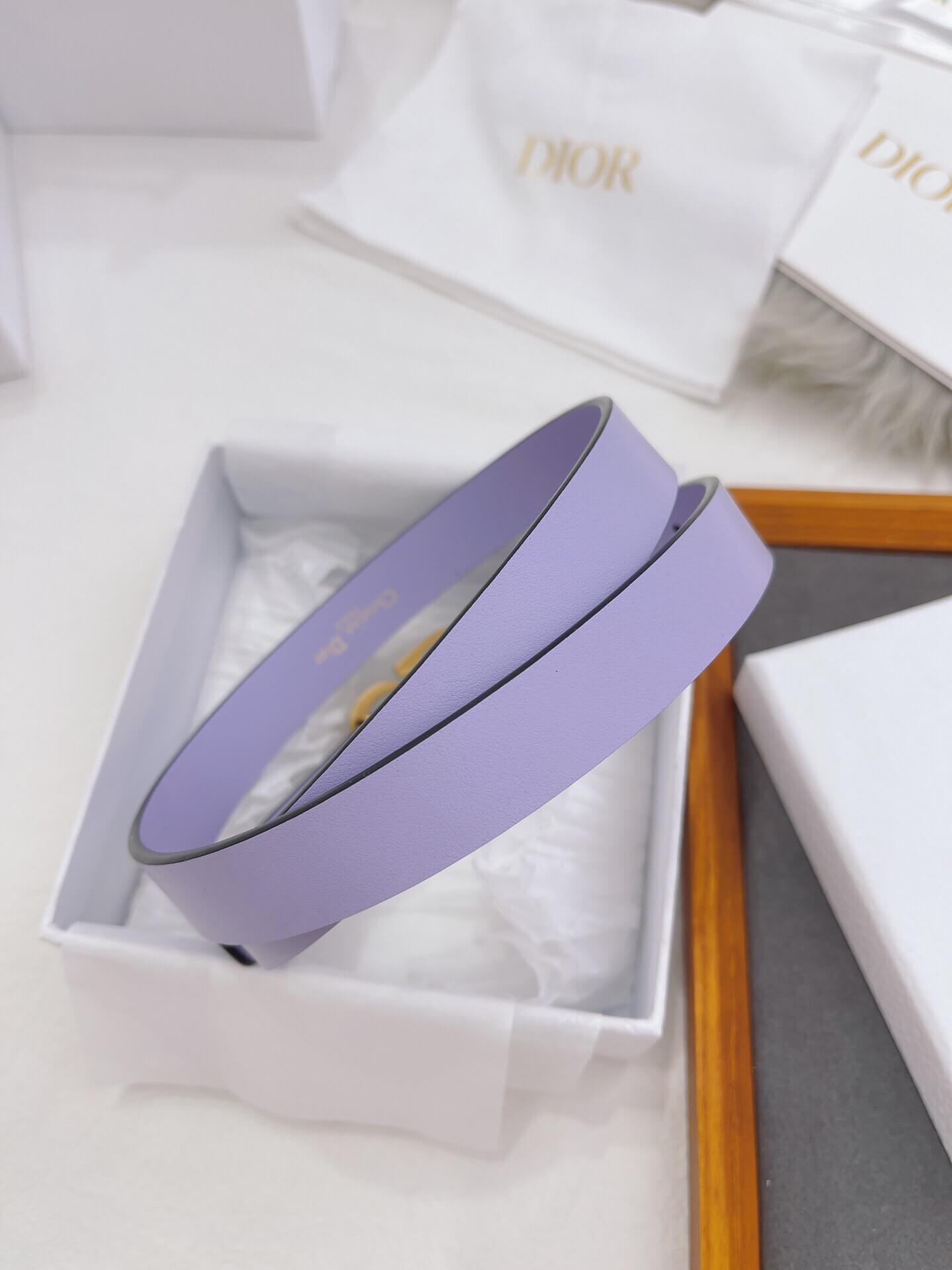 Purple belt in a Dior box with white tissue paper