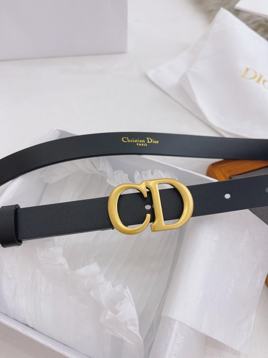 Black belt with gold Dior buckle on a white background