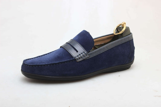 Classic Navy Blue Suede Driving Loafers – side view with a shoe tree, highlighting premium suede and a durable rubber driving sole.