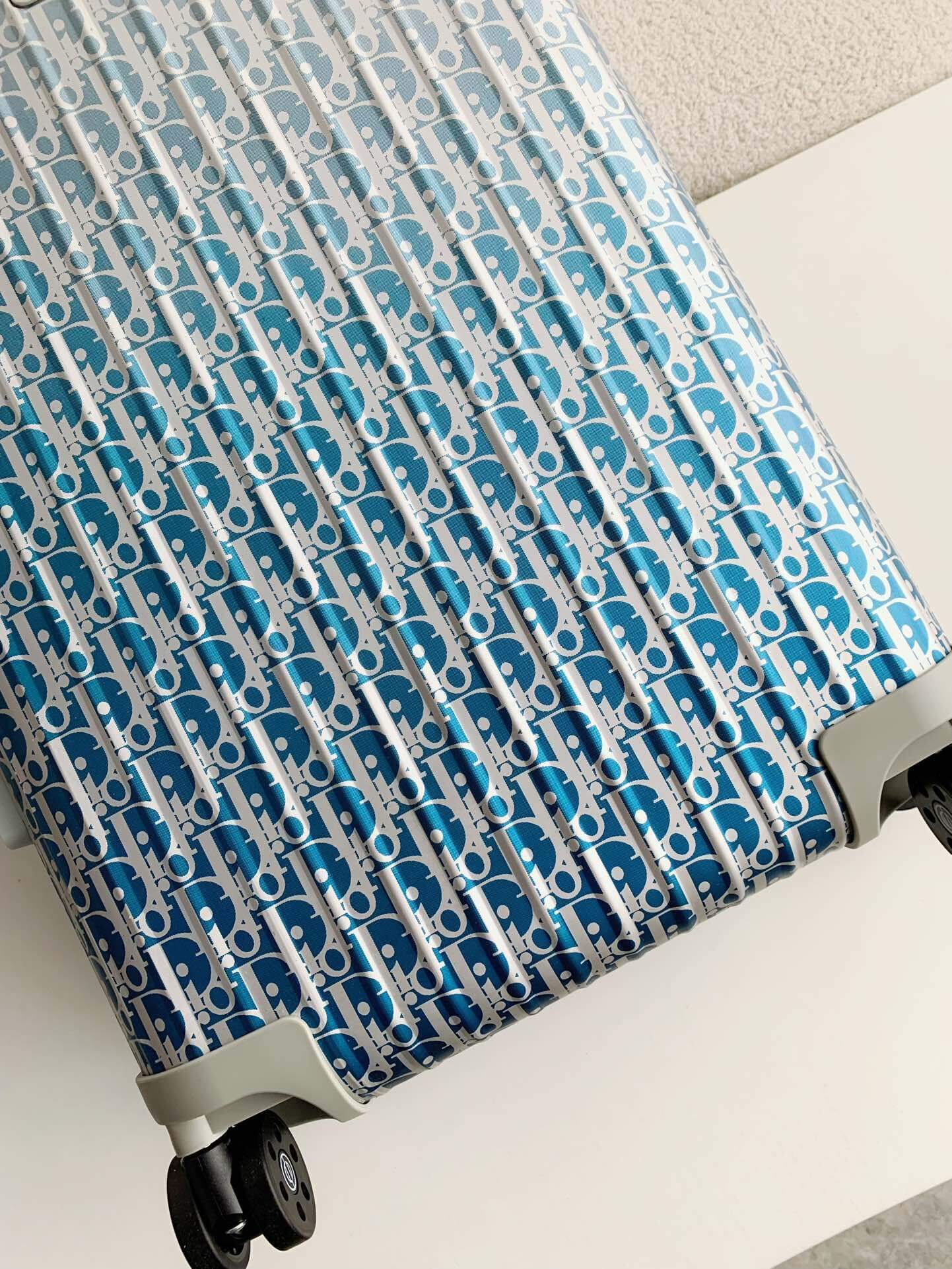 Patterned suitcase on a light background