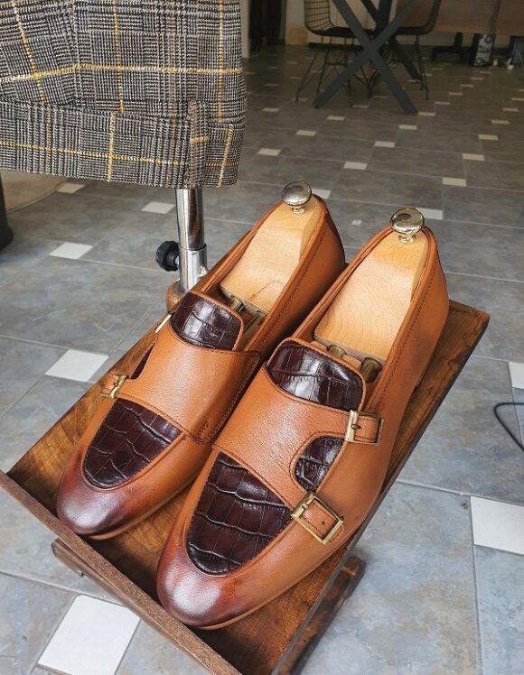 Elegant Tan Double Monk Strap Loafers – pair with shoe trees, top-down view, showcasing rich tan hue and double buckle design.