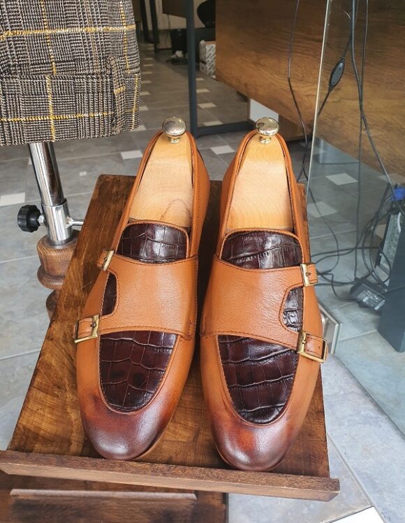 Elegant Tan Double Monk Strap Loafers – pair with shoe trees, top-down view, showcasing rich tan hue and double buckle design.