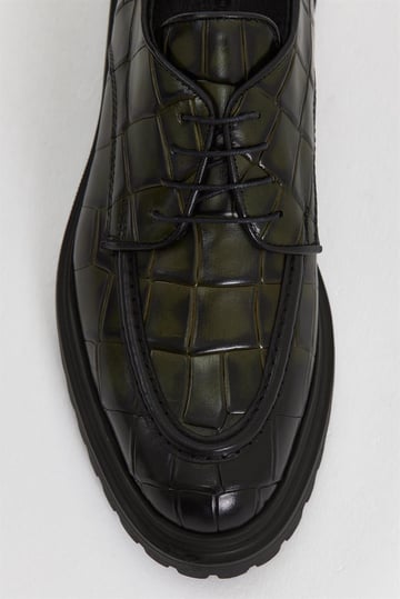 Green Croco Patterned Derby Shoe – close-up top-down view, highlighting genuine crocodile leather texture and intricate lace details.