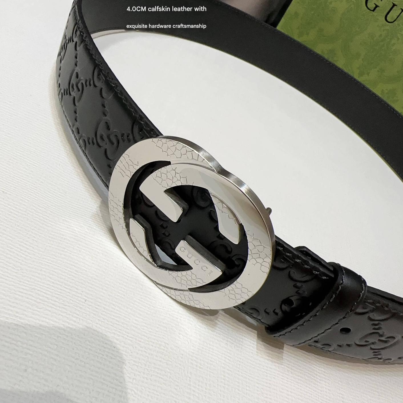 Black leather belt with silver Gucci buckle on a white background