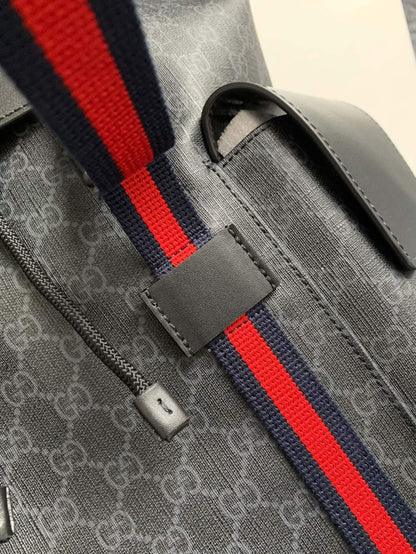 Gucci Men's Black Stripe GG Supreme Backpack.