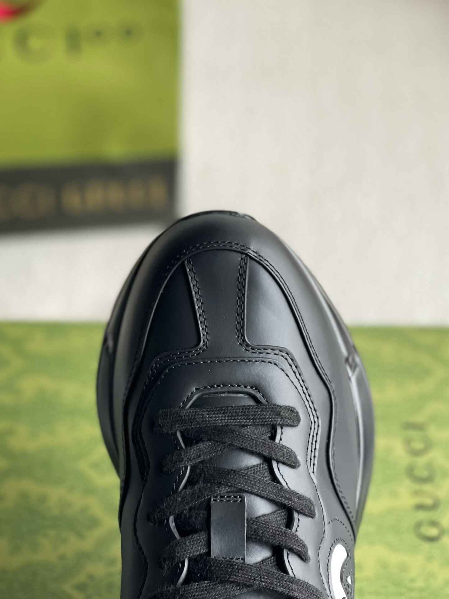 Gucci Rhyton Sneaker – Black Leather with White Interlocking G