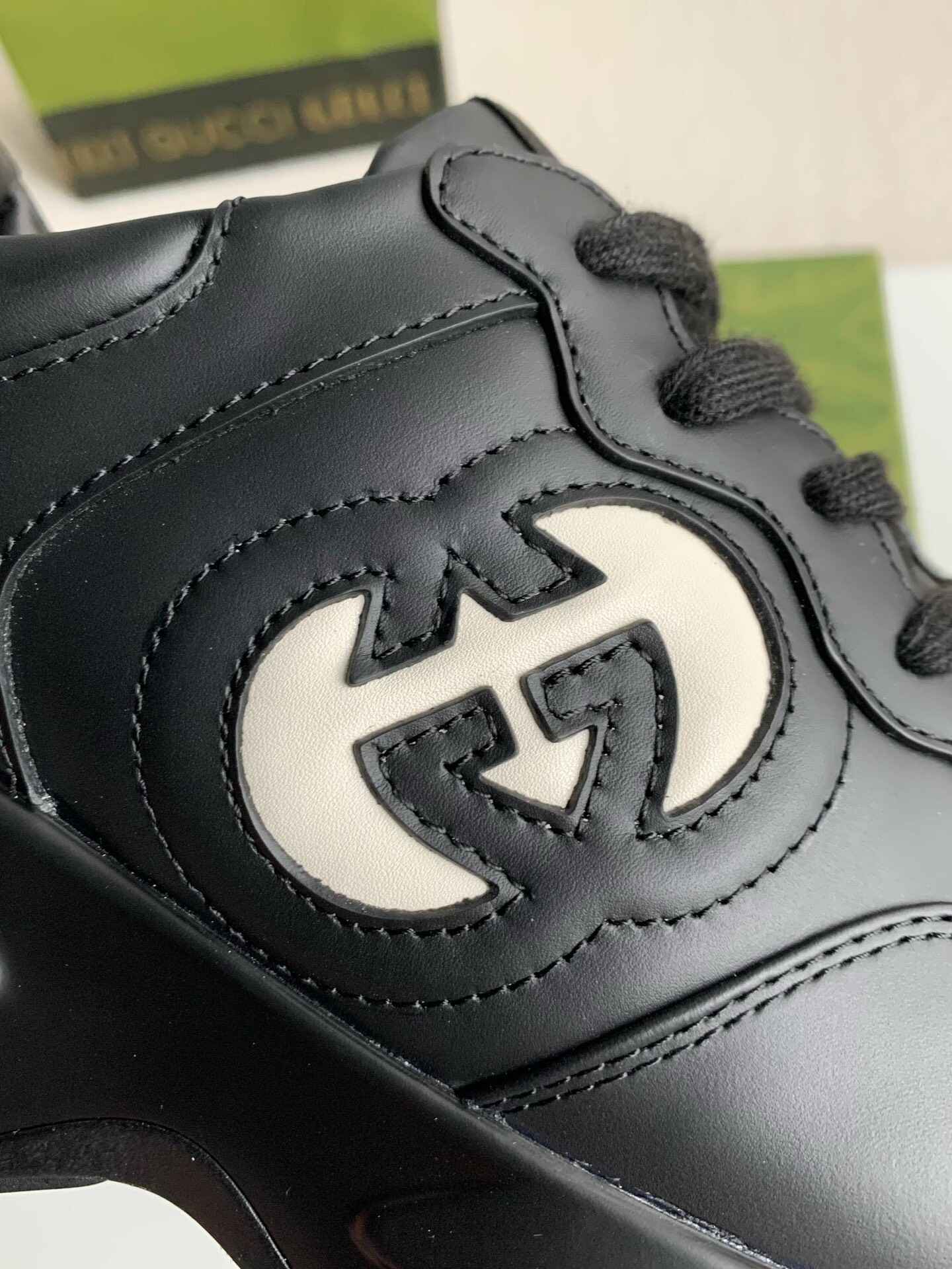 Gucci Rhyton Sneaker – Black Leather with White Interlocking G