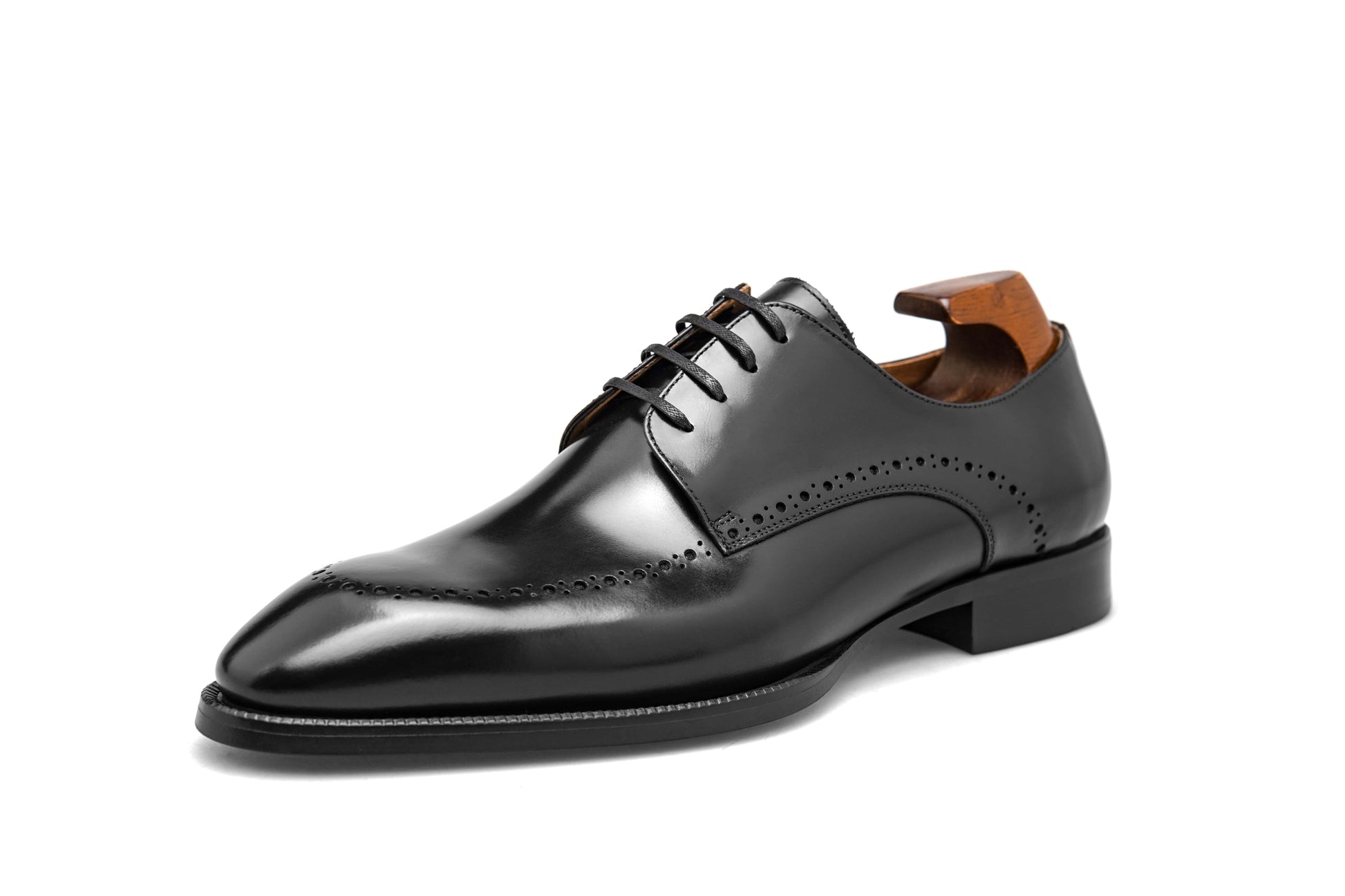 Handcrafted Black Half-Brogue Derby shoe – polished leather, top-down view with shoe tree and brogue detailing.