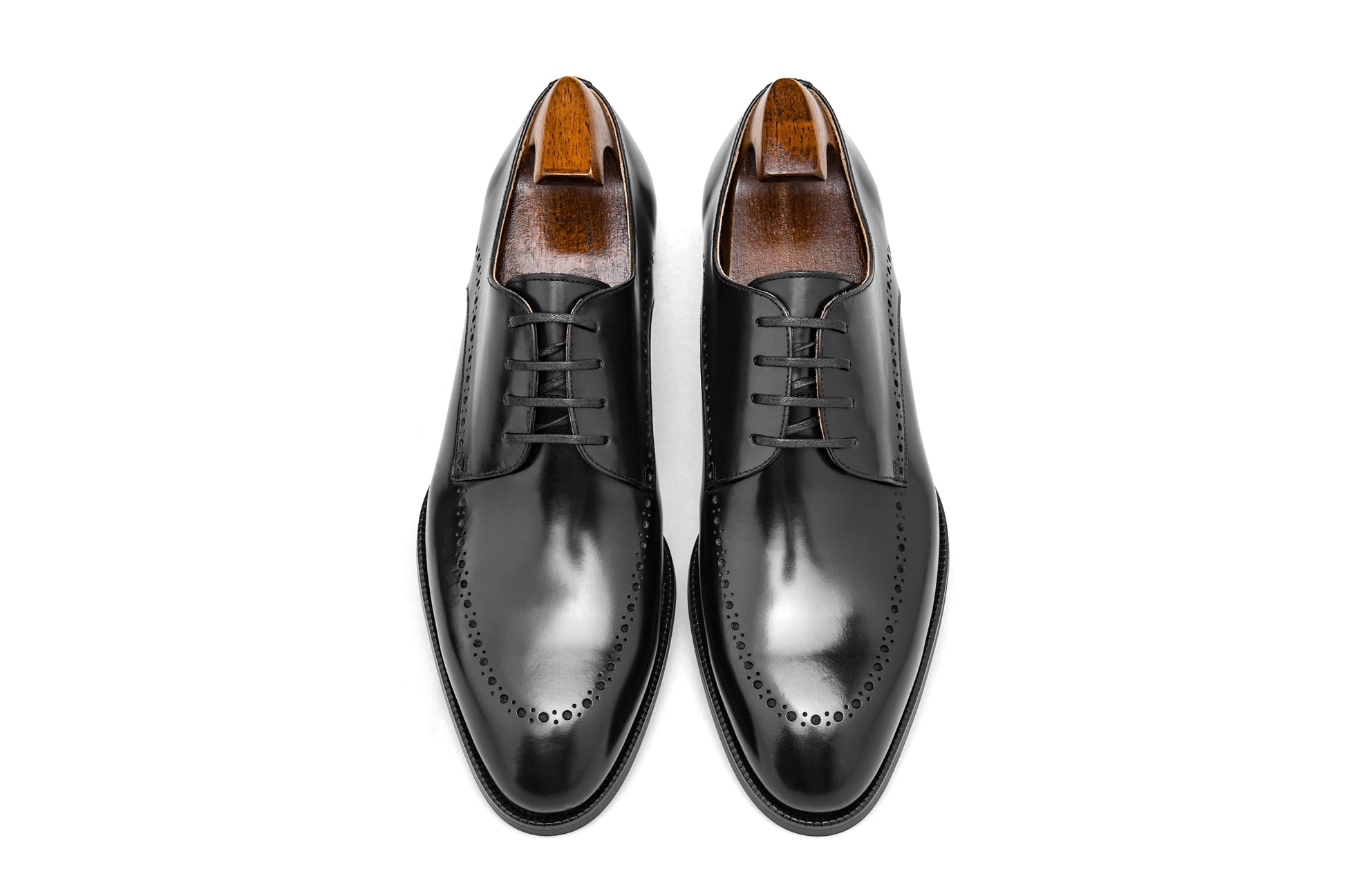 Pair of Polished Black Half-Brogue Derby Shoes – top-down view, high-shine leather, perfect for modern formal wear.