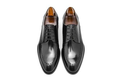 Pair of Polished Black Half-Brogue Derby Shoes – top-down view, high-shine leather, perfect for modern formal wear.