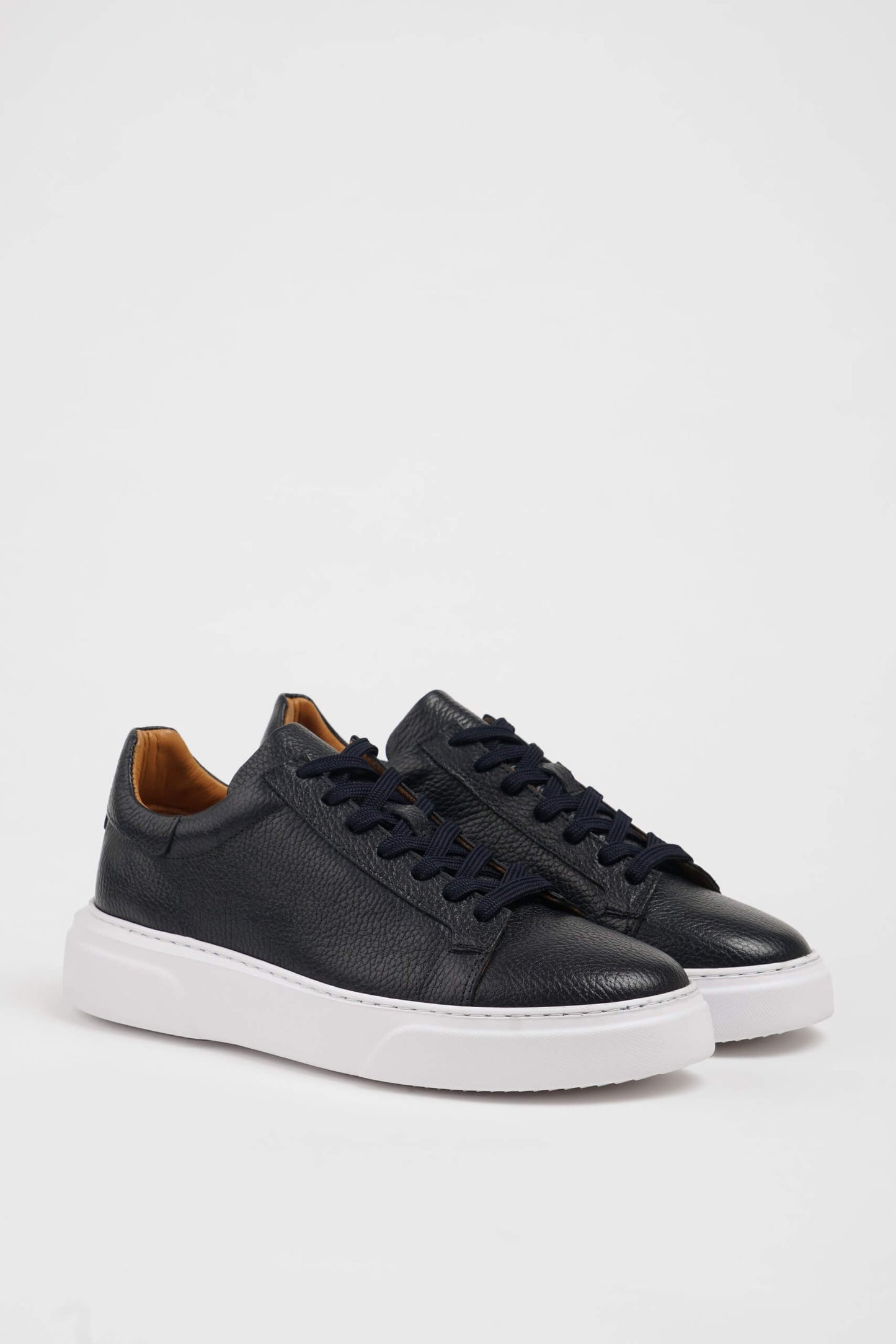 Handcrafted Black Grained Leather Sneakers with Pool Sole – pair on a white background, showcasing premium black leather and a contrasting white sole.