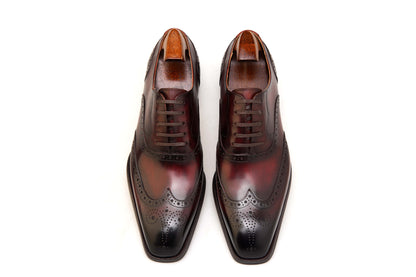 Luxury handcrafted burgundy Oxford brogue dress shoes – leather finish top-down angled view