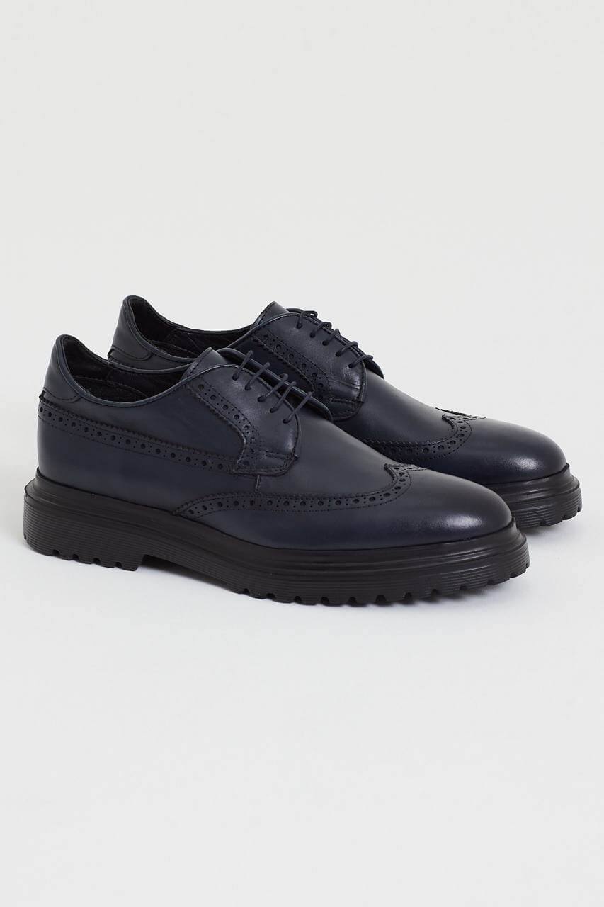 Pair of Navy Blue Brogue Derby Shoes – handcrafted premium calf leather, angled view, highlighting brogue details and chunky sole for comfort.