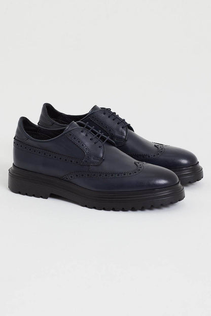 Pair of Navy Blue Brogue Derby Shoes – handcrafted premium calf leather, angled view, highlighting brogue details and chunky sole for comfort.