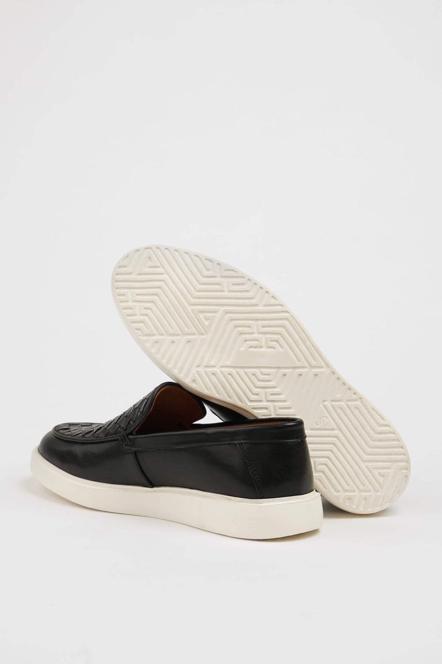 HolloShoe Black Leather Casual Shoes with Knitted Detail – side view, displaying a sleek slip-on design with a unique knitted texture and comfortable sole.