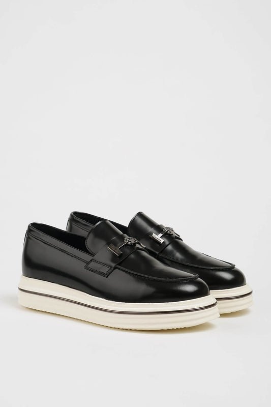 HolloShoe Black Leather Slip-On Loafers with Horsebit Detailing – pair on a white background, highlighting a sleek silhouette and polished finish with a distinctive silver-toned horsebit detail.