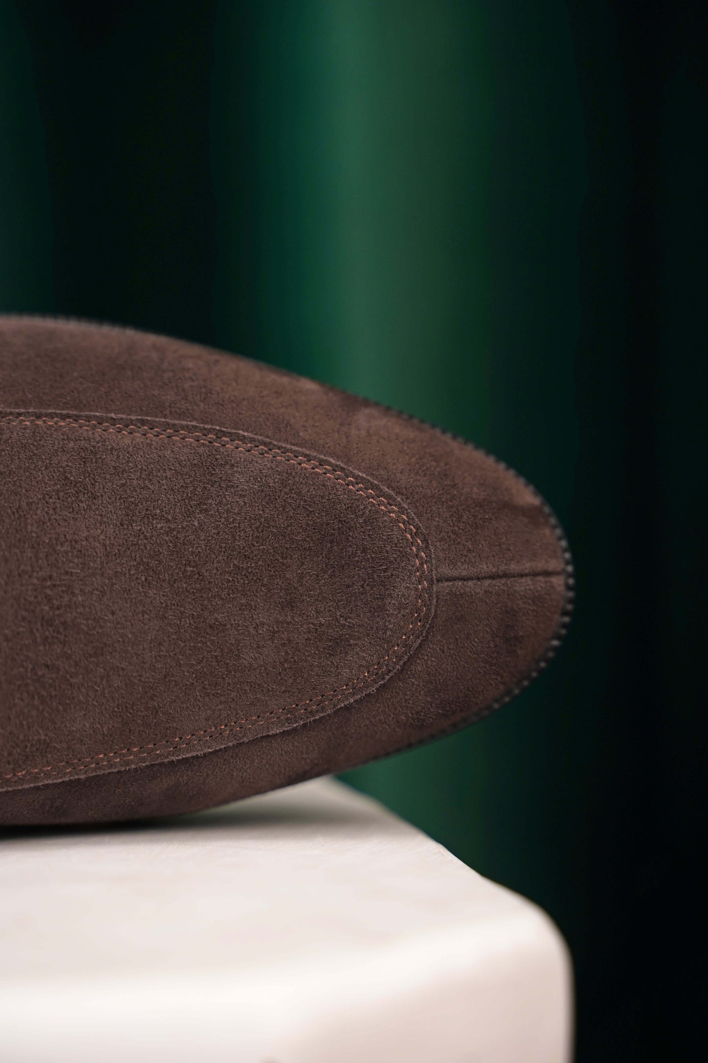 Earth Brown Suede Penny Loafers – close-up of the toe, showcasing the refined stitching and soft brown suede texture for minimalist style.
