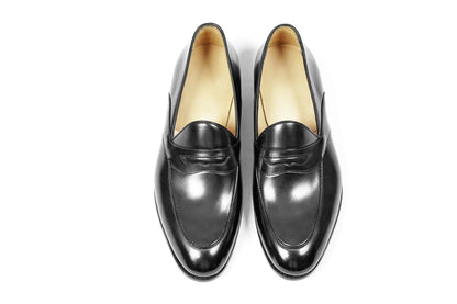HolloShoe Handmade Black Leather Penny Loafers – top-down view of pair on white background, emphasizing sleek black leather and timeless design.