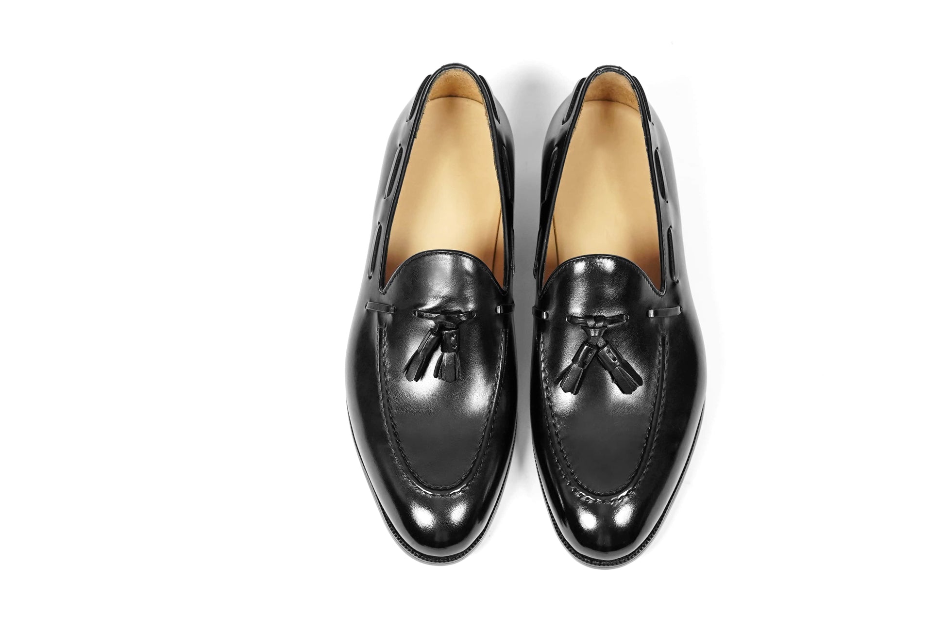 HolloShoe Handmade Black Tassel Leather Loafers – top-down view of pair, emphasizing sleek black polished leather and versatile design.
