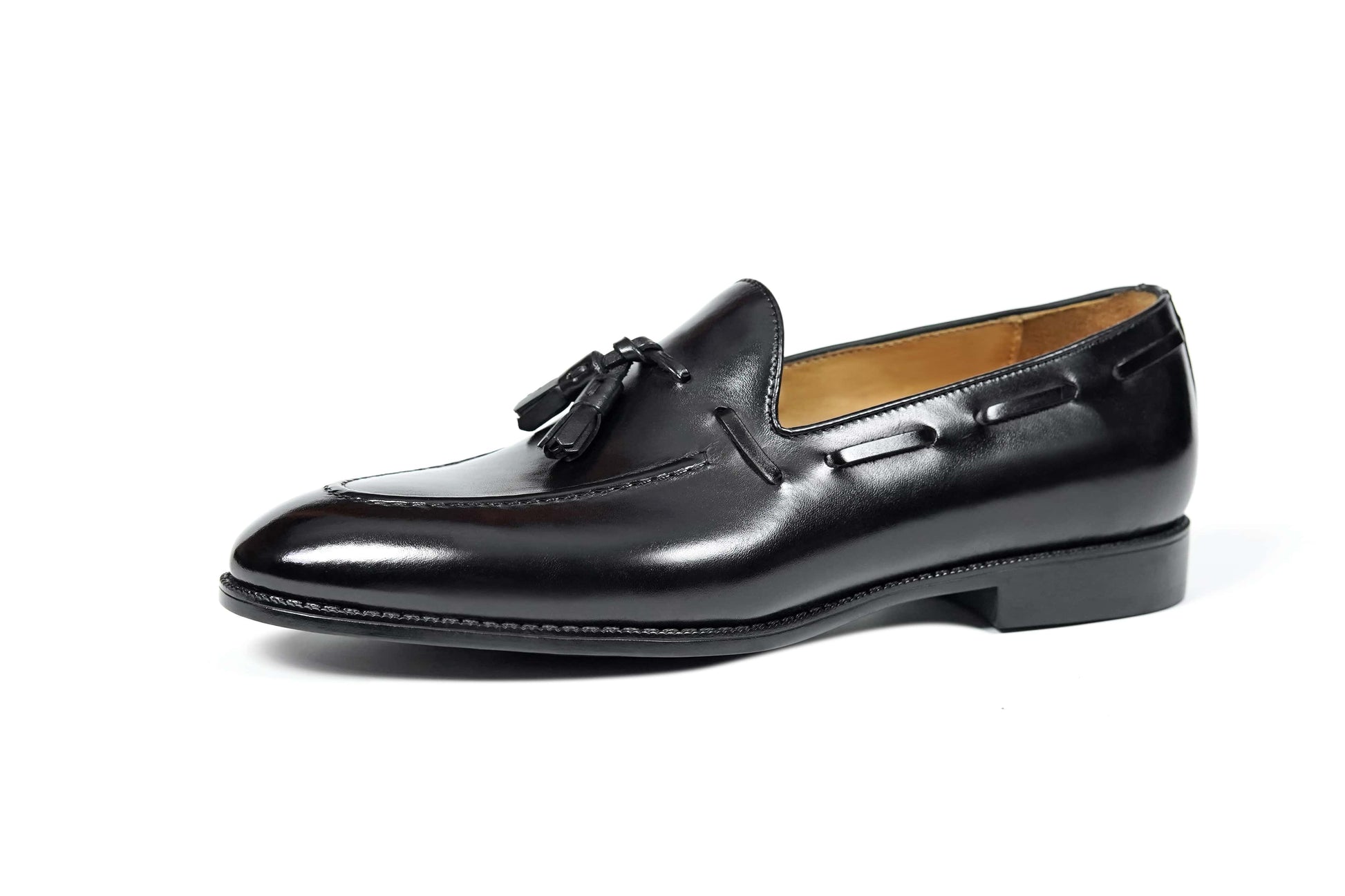 HolloShoe Handmade Black Tassel Leather Loafer – side view on white background, showcasing high-shine full-grain leather and classic tassel detail.