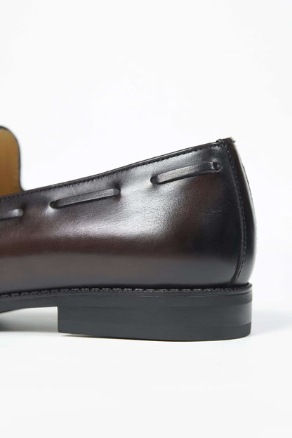 HolloShoe Handmade Chestnut Brown Patina Tassel Loafer – close-up of the heel, showcasing burnished dark brown leather and fine stitching.