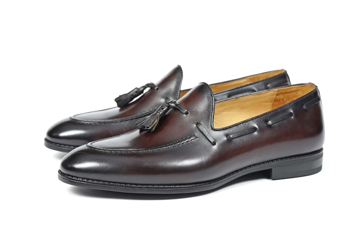 HolloShoe Handmade Chestnut Brown Patina Tassel Loafers – pair on white background, showcasing burnished dark brown leather and classic tassels for versatile style.