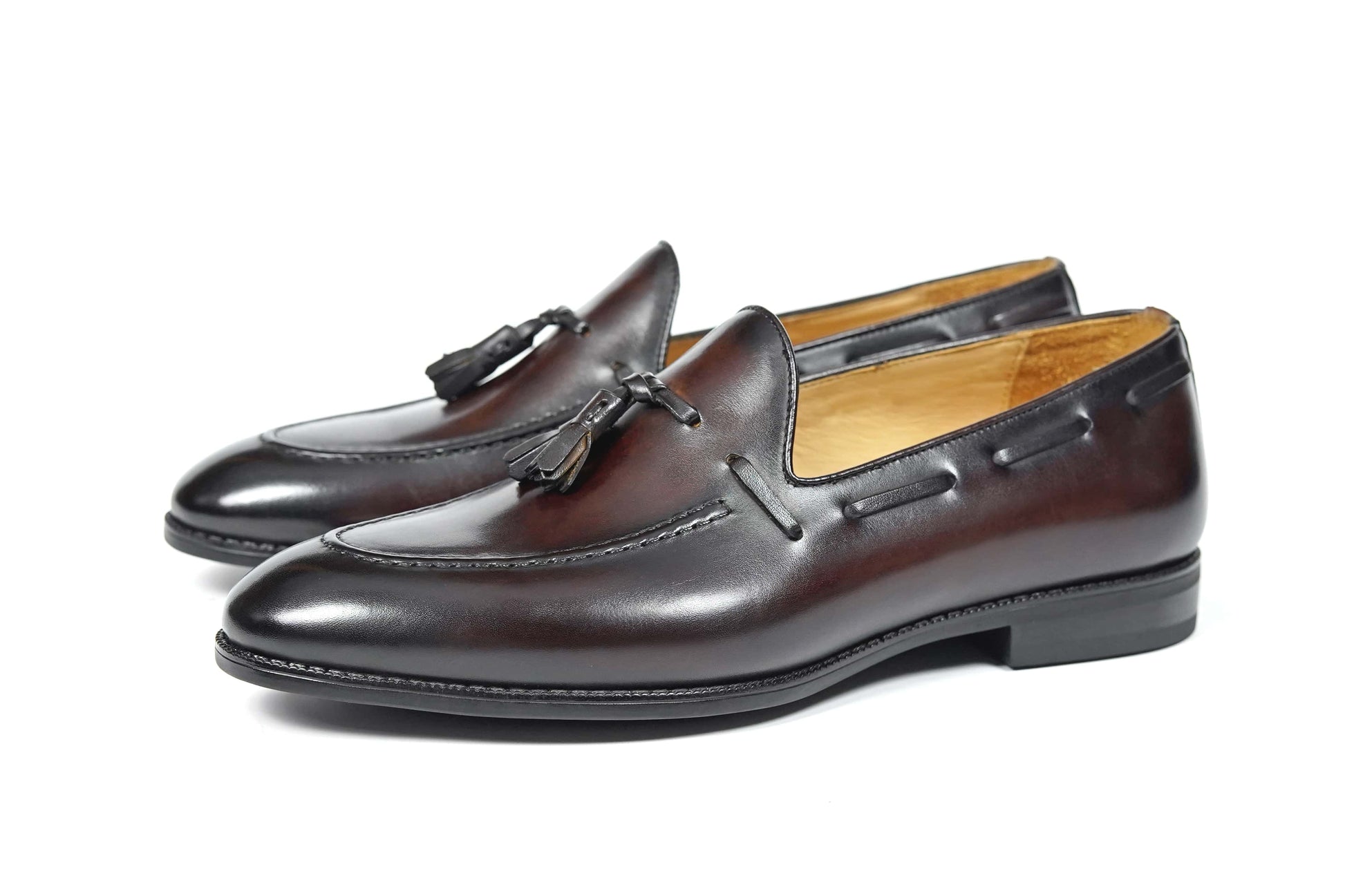HolloShoe Handmade Chestnut Brown Patina Tassel Loafers – pair on white background, showcasing burnished dark brown leather and classic tassels for versatile style.