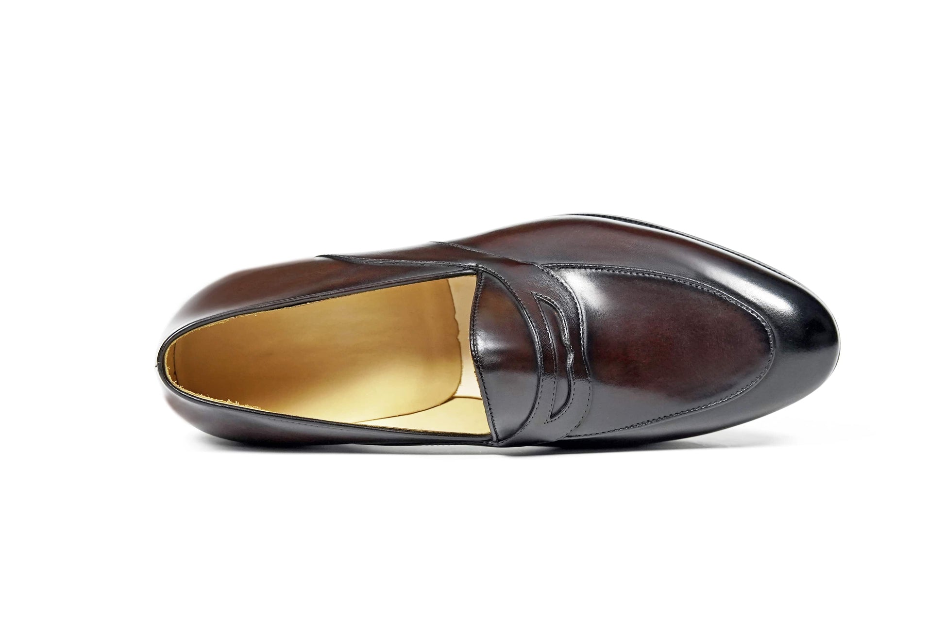 HolloShoe Handmade Dark Tan Leather Penny Loafer – top-down view, showcasing sleek silhouette and rich dark tan leather with subtle contours.