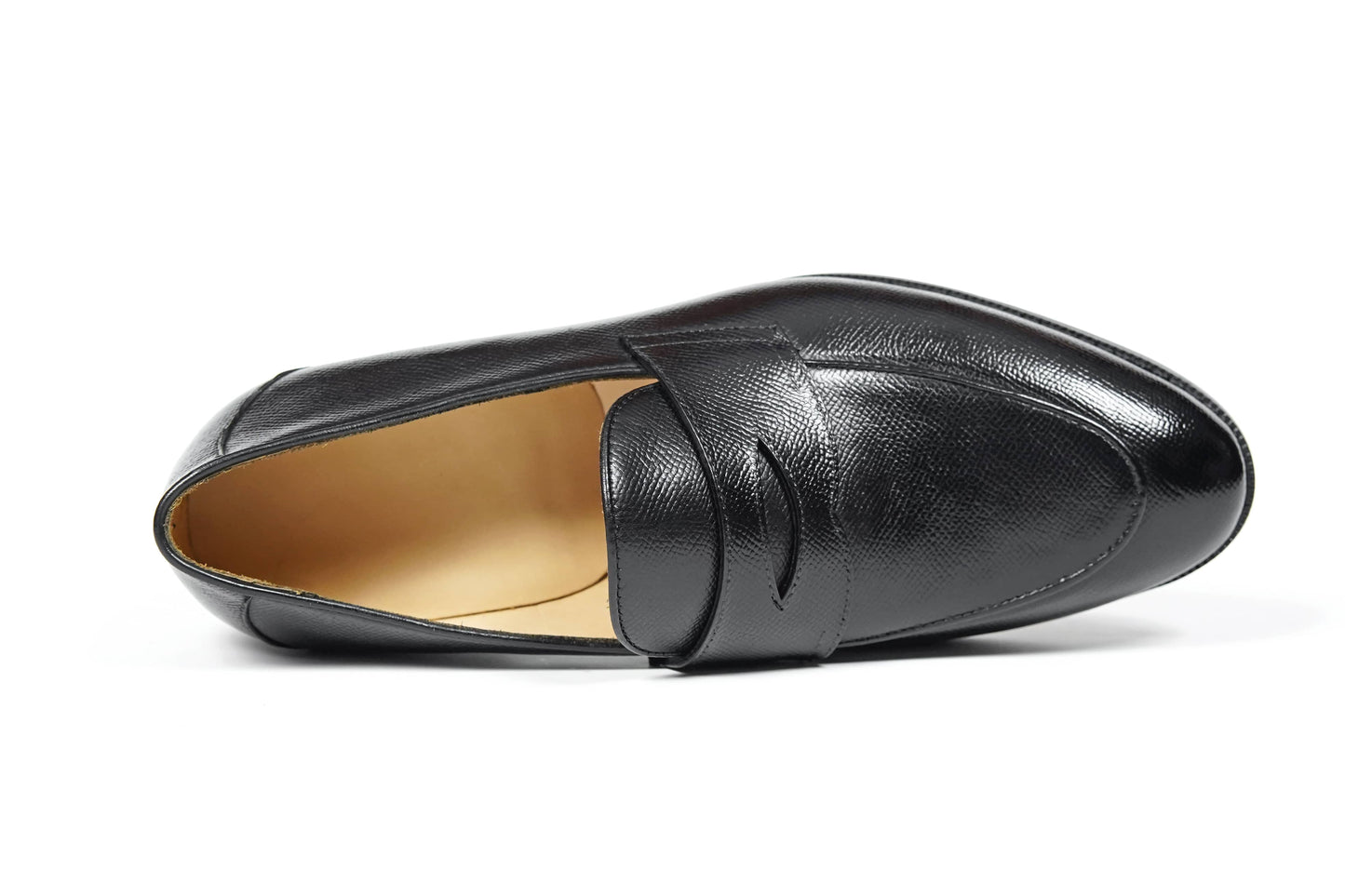 HolloShoe Black Penny Loafer – side view on white background, highlighting textured black leather and classic slip-on design.