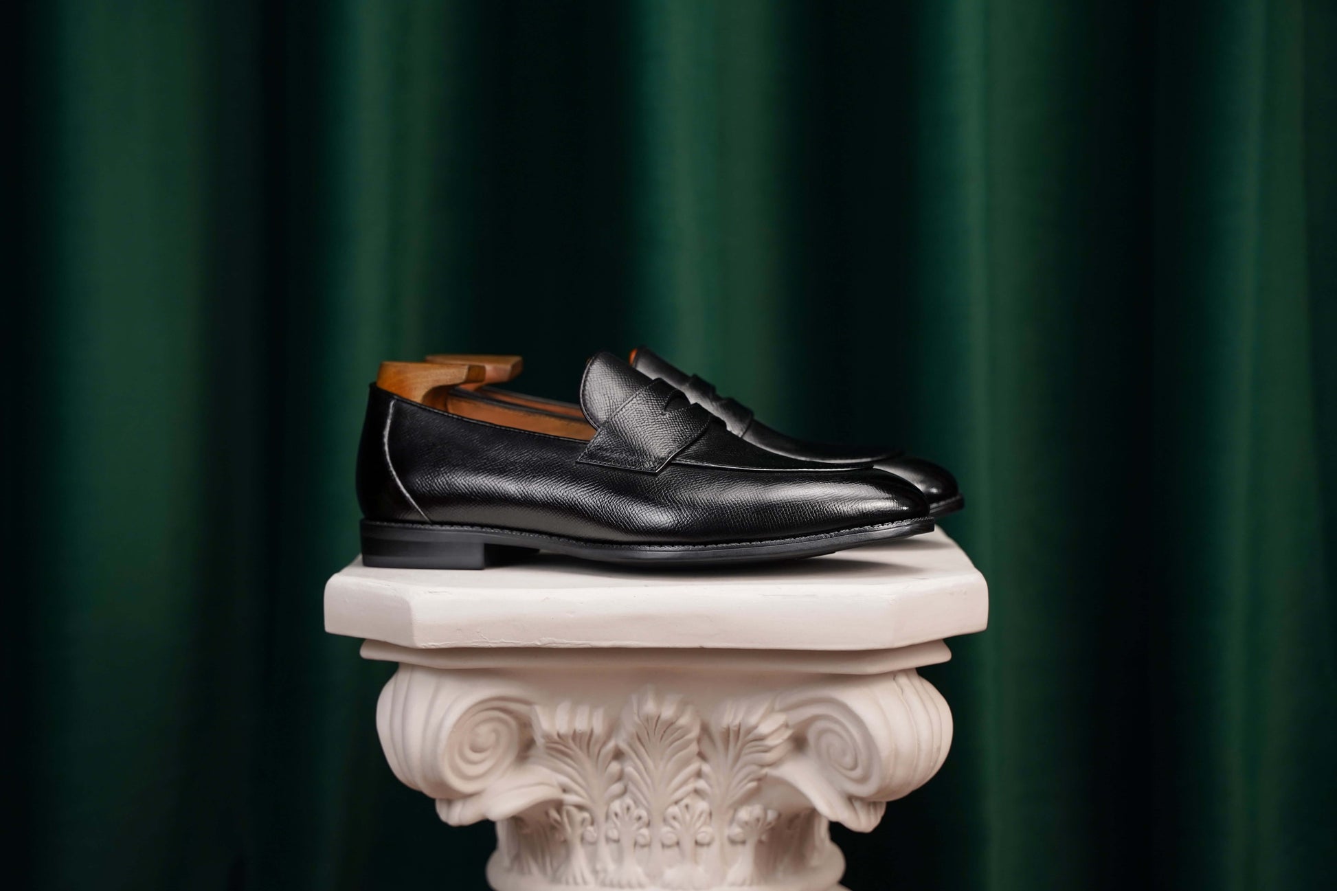 HolloShoe Black Penny Loafer – close-up of textured full-grain black leather upper with polished toe and refined penny slot detail.