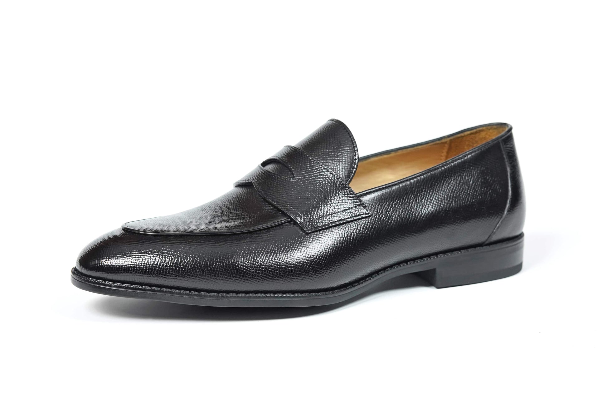 HolloShoe Black Penny Loafer – side view on white background, highlighting textured black leather and classic slip-on design.