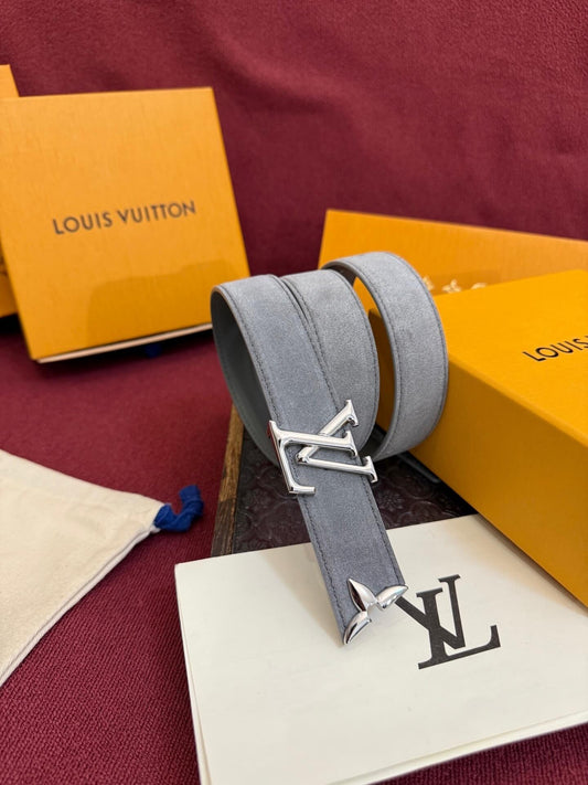 Gray belt with silver buckle on a Louis Vuitton box and packaging.