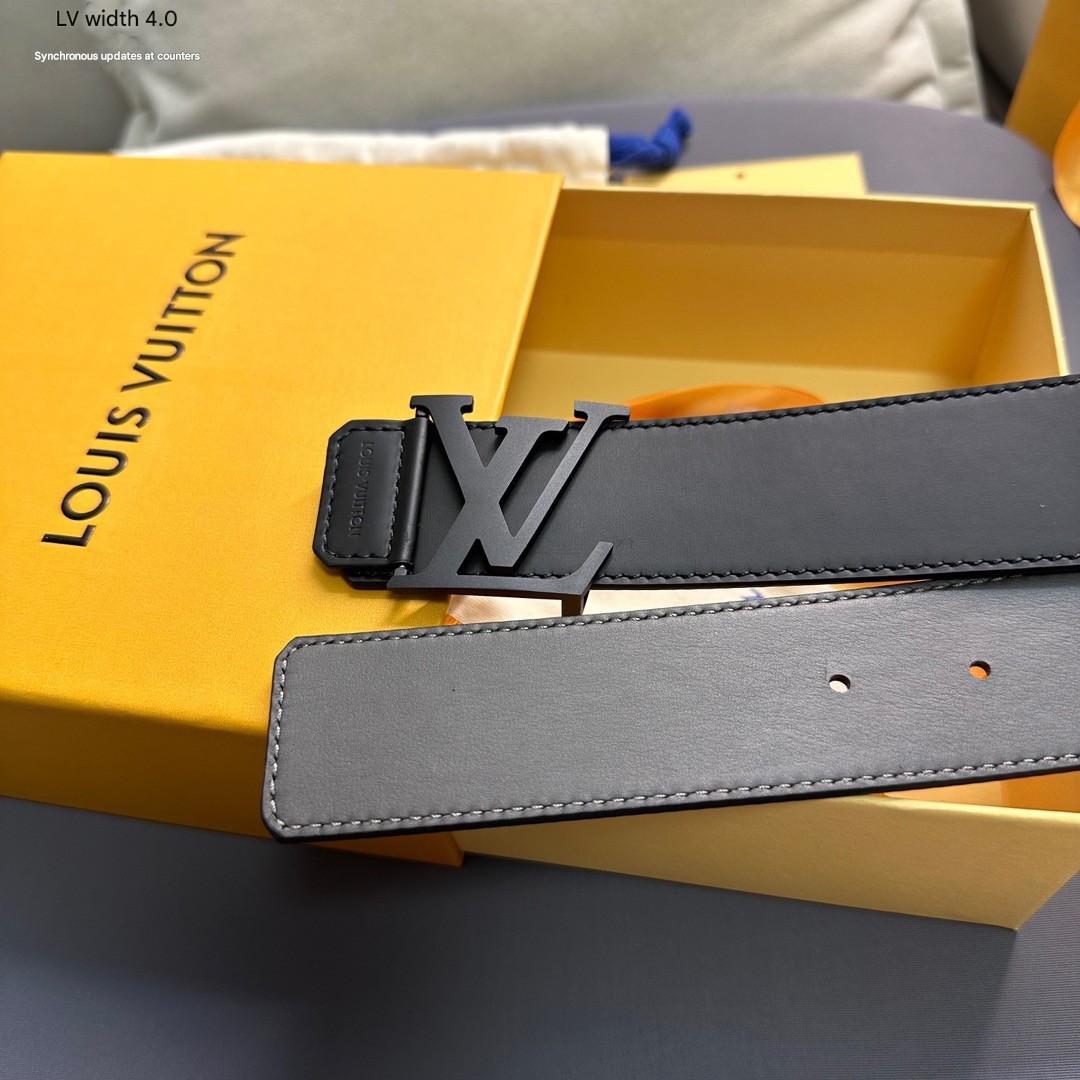 Louis Vuitton belt with black buckle on a yellow box