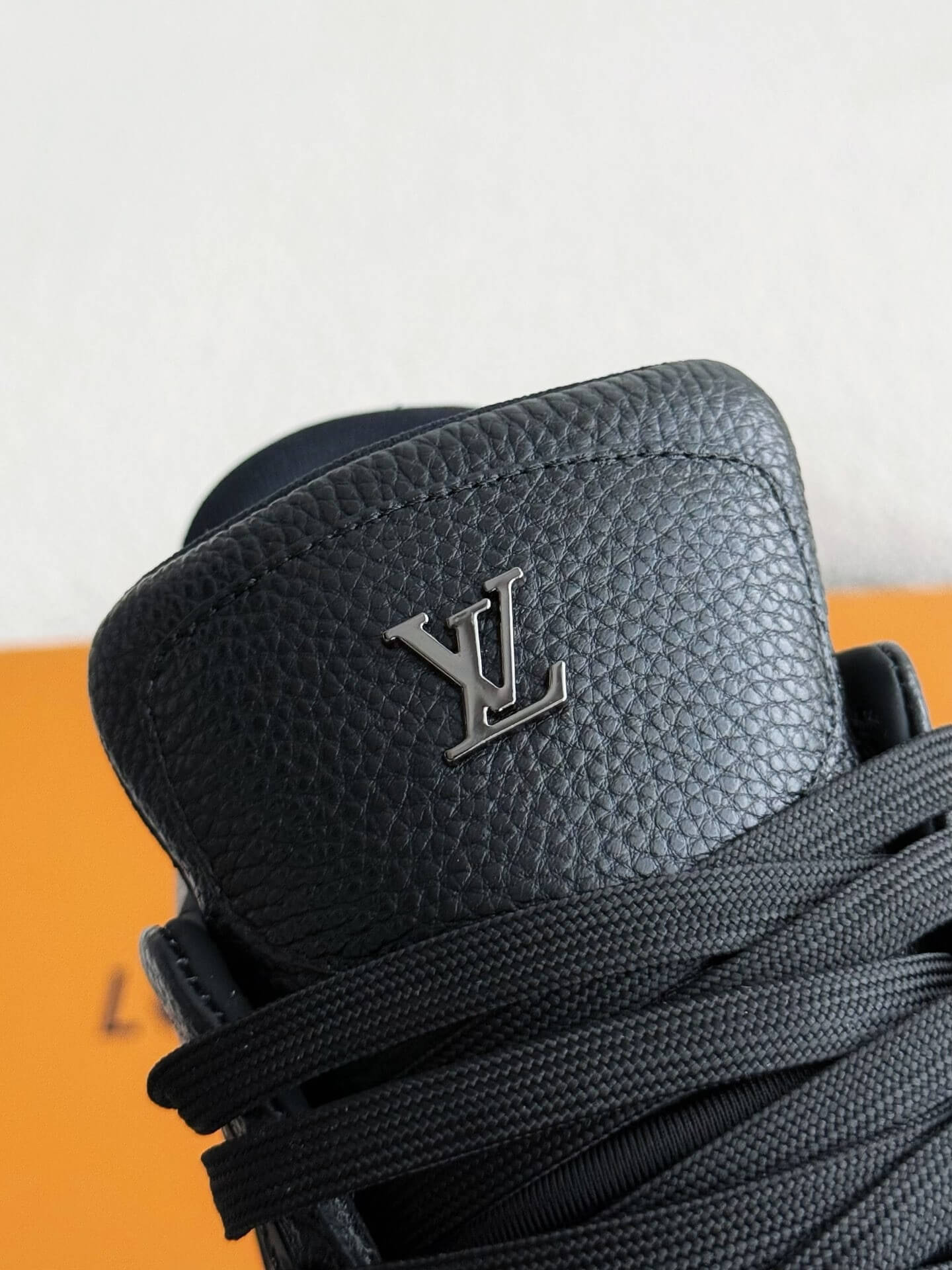 Louis Vuitton LV Trainer #54 Black Sneaker with Metallic Accents